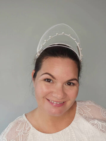 A picture of a White Crinoline Floating Millinery Crown by Melissa Rath Millinery.