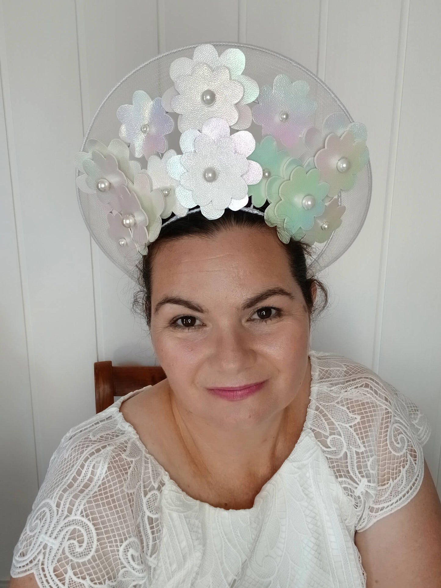 A picture of a White Pleather and Crinoline Millinery Halo Crown by Melissa Rath Millinery.
