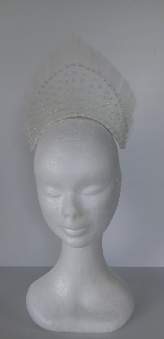 A picture of a White Beaded Tulle Millinery Crown by Melissa Rath Millinery.