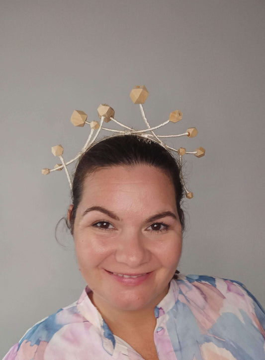 A picture of a Wooden Beaded Millinery Headband by Melissa Rath Millinery