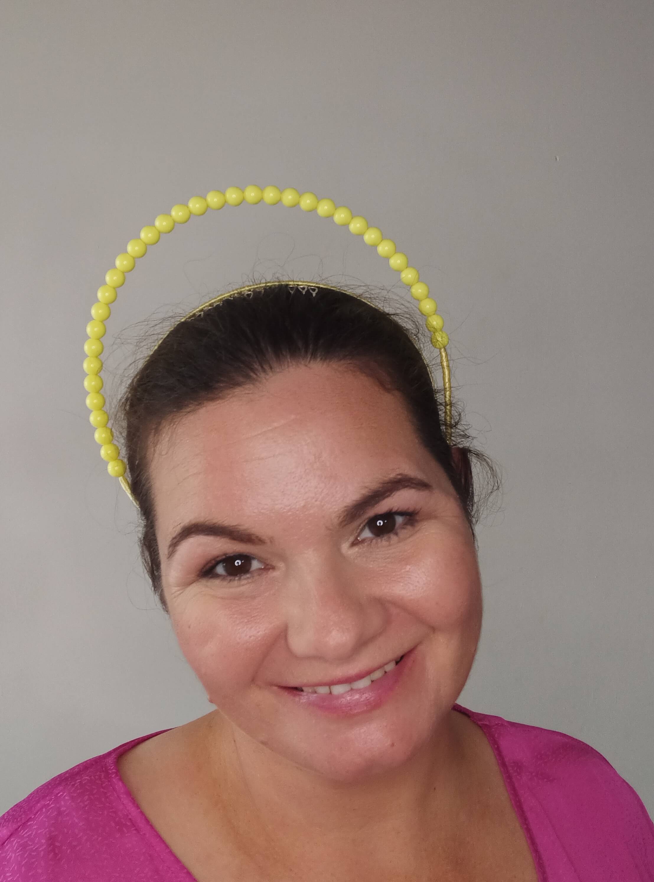 A picture of a Yellow Beaded Headband by Melissa Rath Millinery