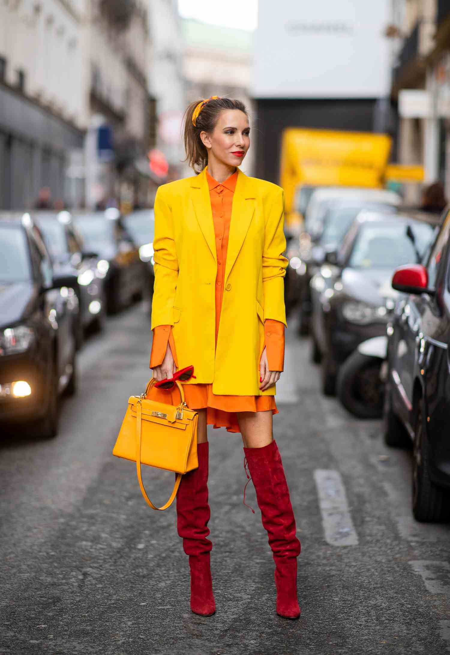 A picture of a woman wearing an outfit in a yellow analogous colour scheme.