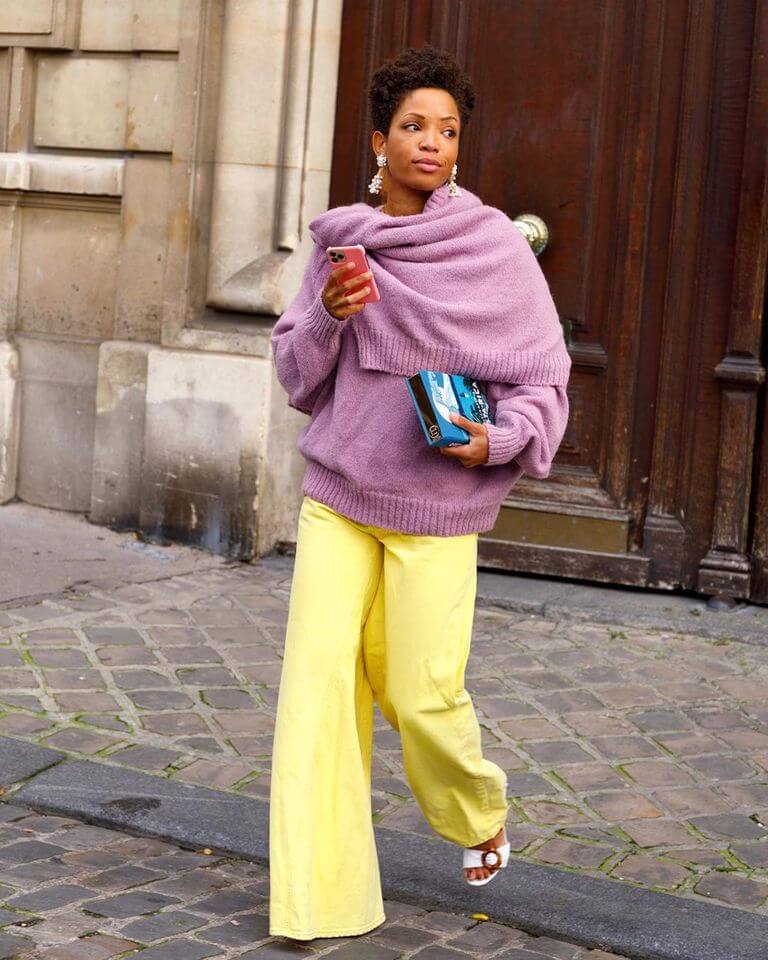 A picture of a woman wearing an outfit in a yellow complementary colour scheme.