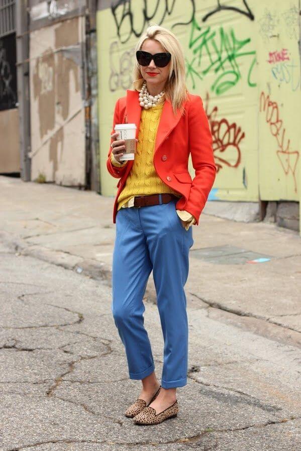 A picture of a woman wearing an outfit in a yellow triadic colour scheme.