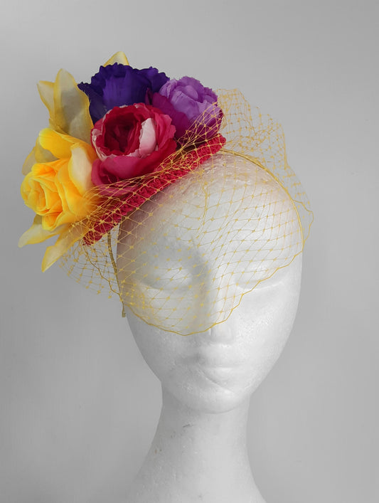 A picture of a Yellow, Pink and Purple Millinery Fascinator by Melissa Rath Millinery.