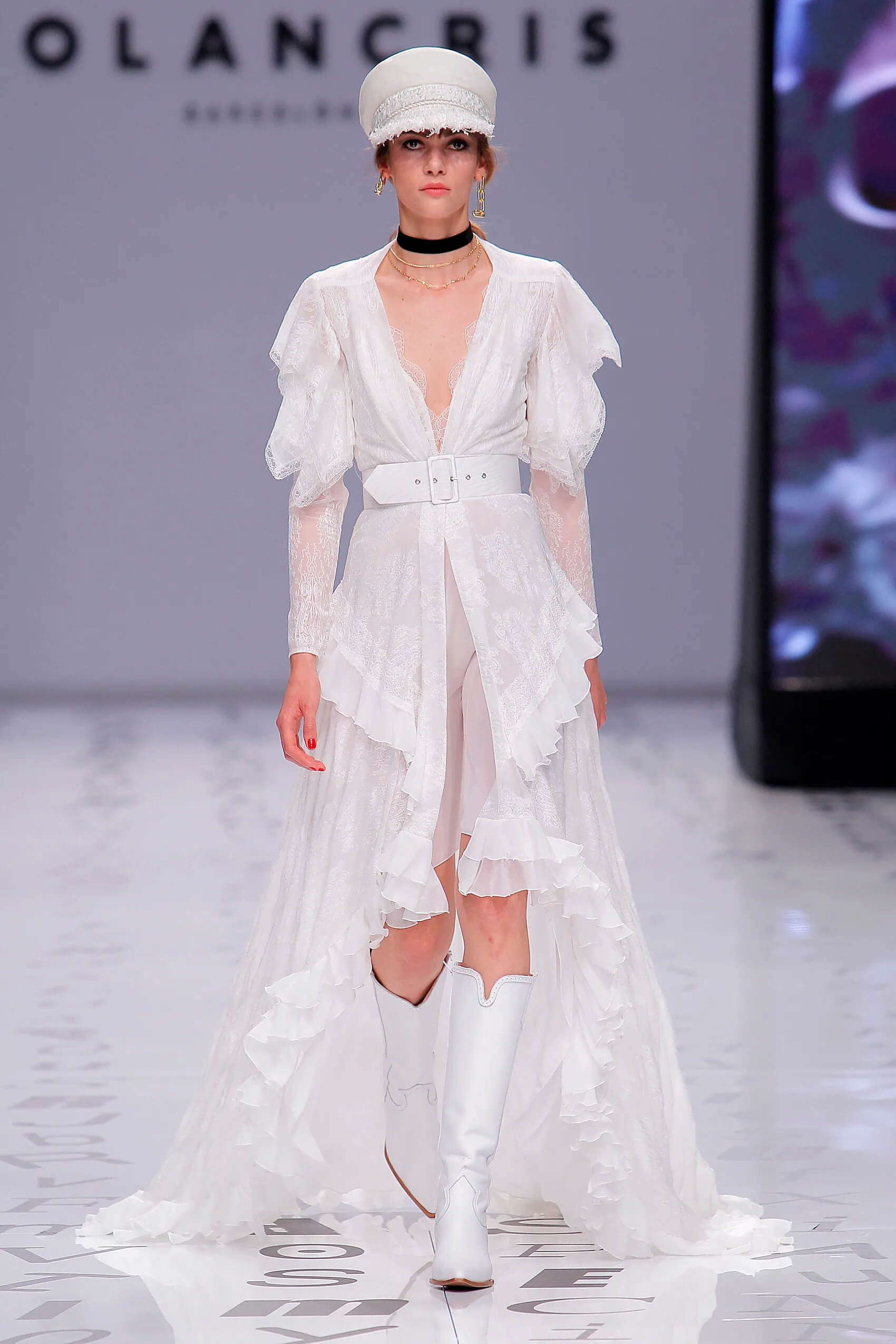 A picture of a model on the catwalk for the Yolan Cris Bridal 2020 catwalk show.