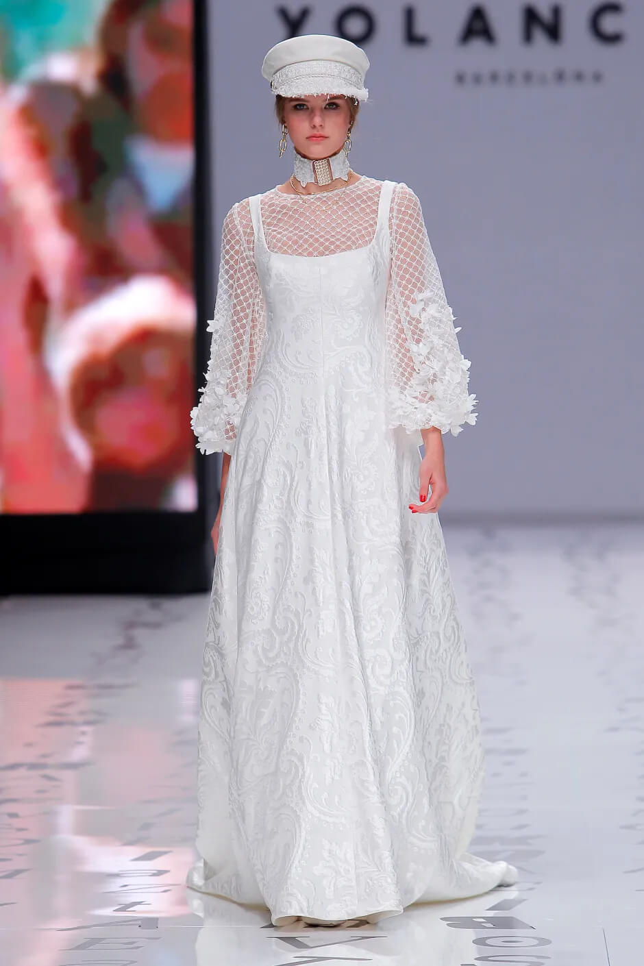 A picture of a model on the catwalk for the Yolan Cris Bridal 2020 catwalk show.