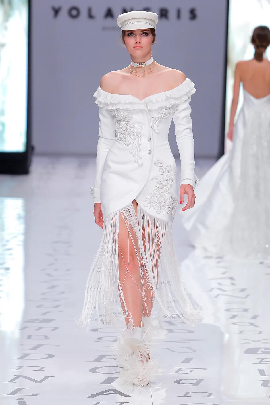 A picture of a model on the catwalk for the Yolan Cris Bridal 2020 catwalk show.