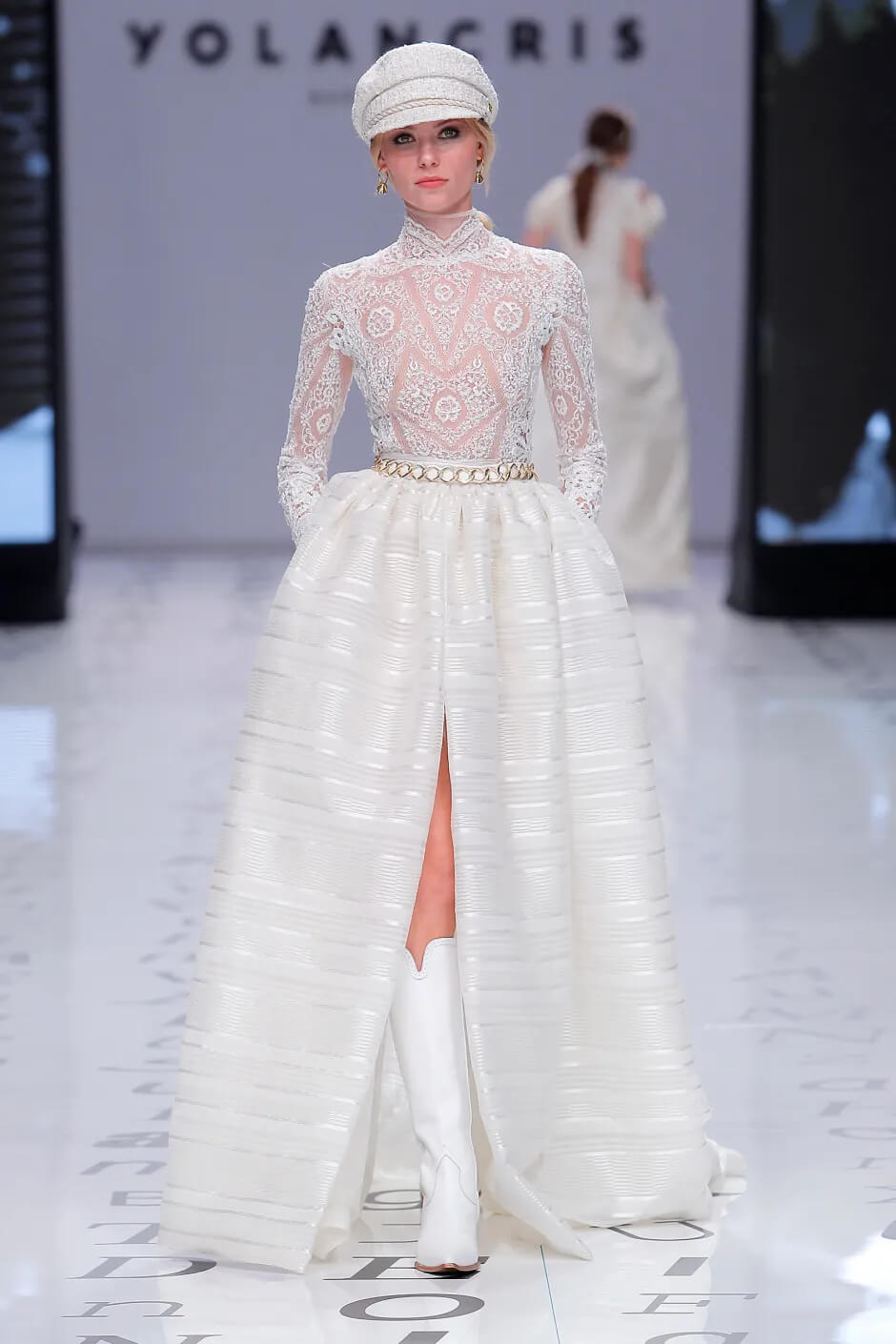 A picture of a model on the catwalk for the Yolan Cris Bridal 2020 catwalk show.