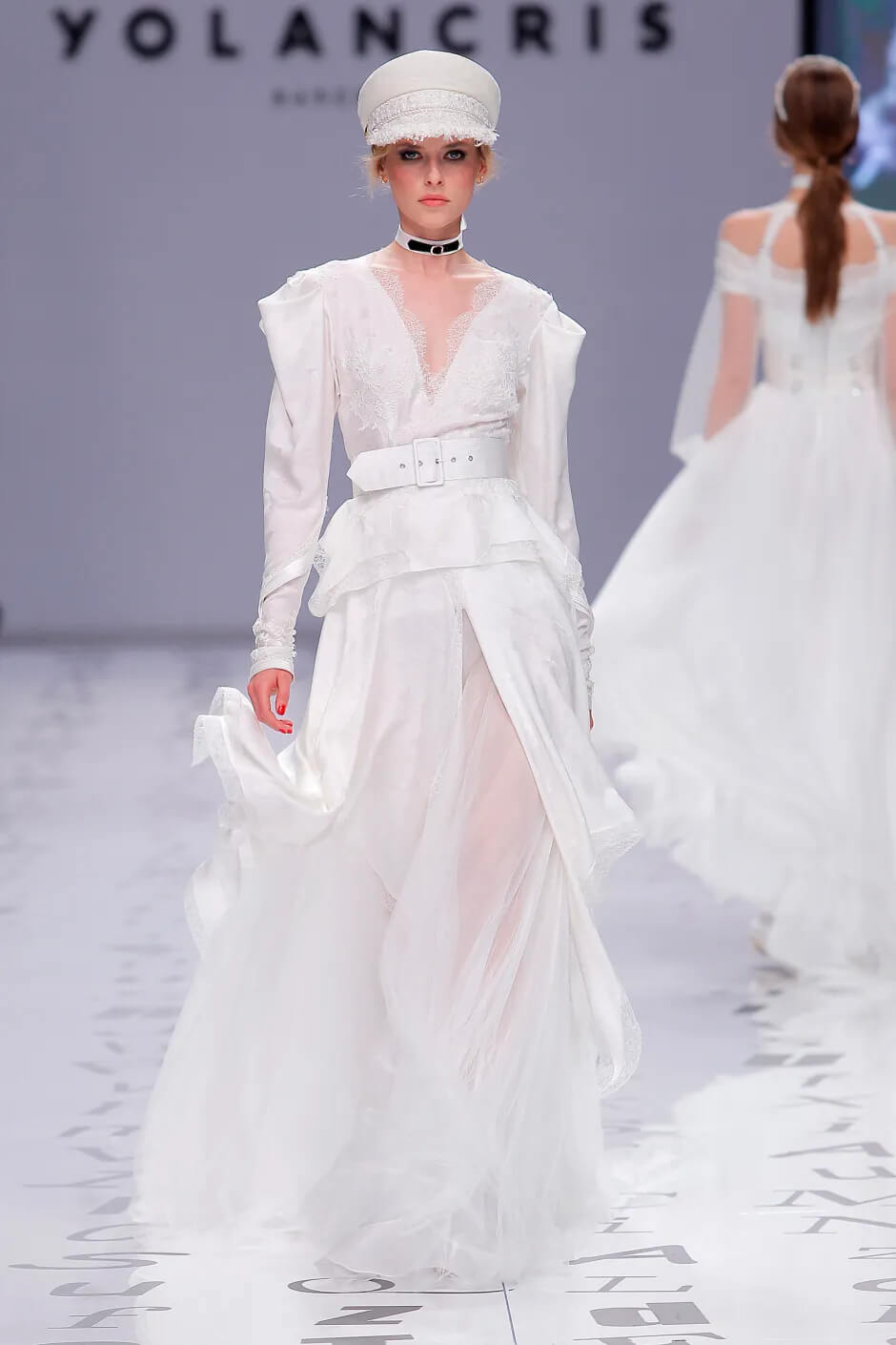 A picture of a model on the catwalk for the Yolan Cris Bridal 2020 catwalk show.