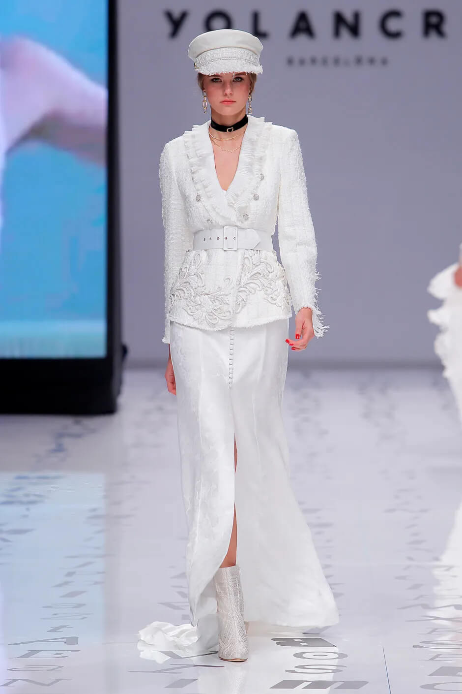 A picture of a model on the catwalk for the Yolan Cris Bridal 2020 catwalk show.