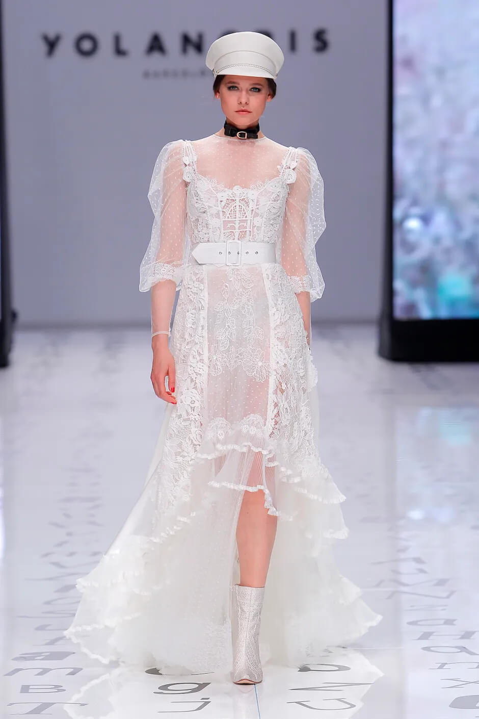 A picture of a model on the catwalk for the Yolan Cris Bridal 2020 catwalk show.