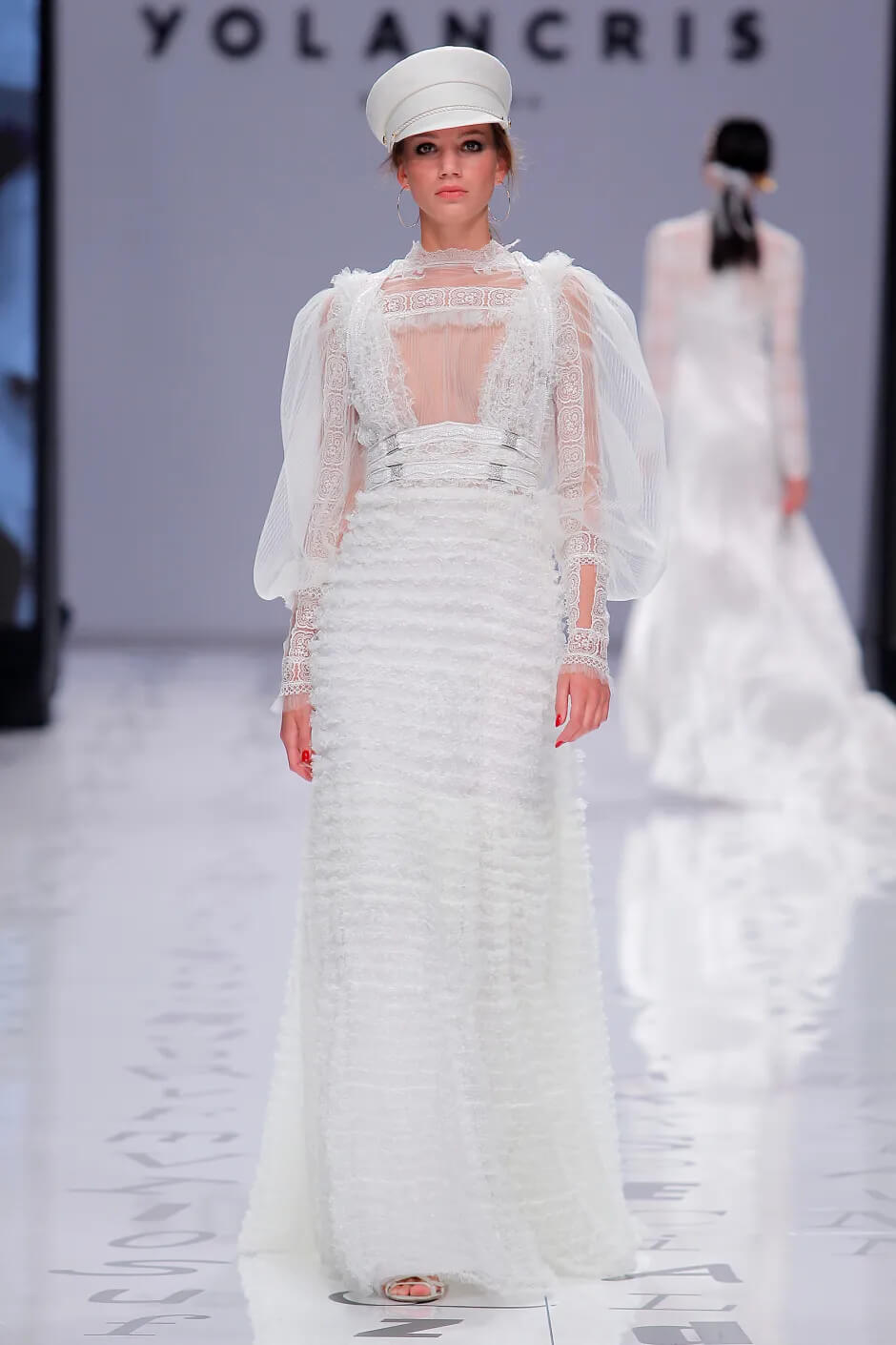A picture of a model on the catwalk for the Yolan Cris Bridal 2020 catwalk show.