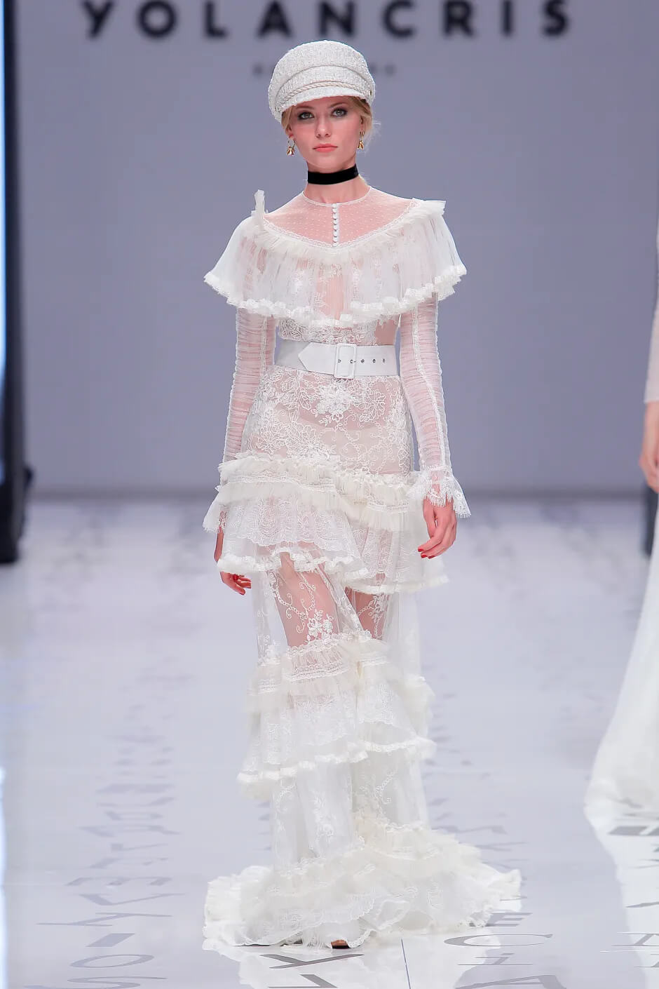 A picture of a model on the catwalk for the Yolan Cris Bridal 2020 catwalk show.