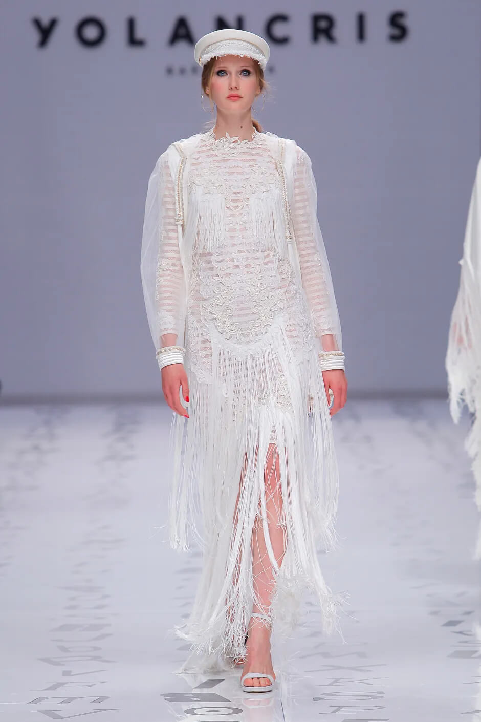 A picture of a model on the catwalk for the Yolan Cris Bridal 2020 catwalk show.