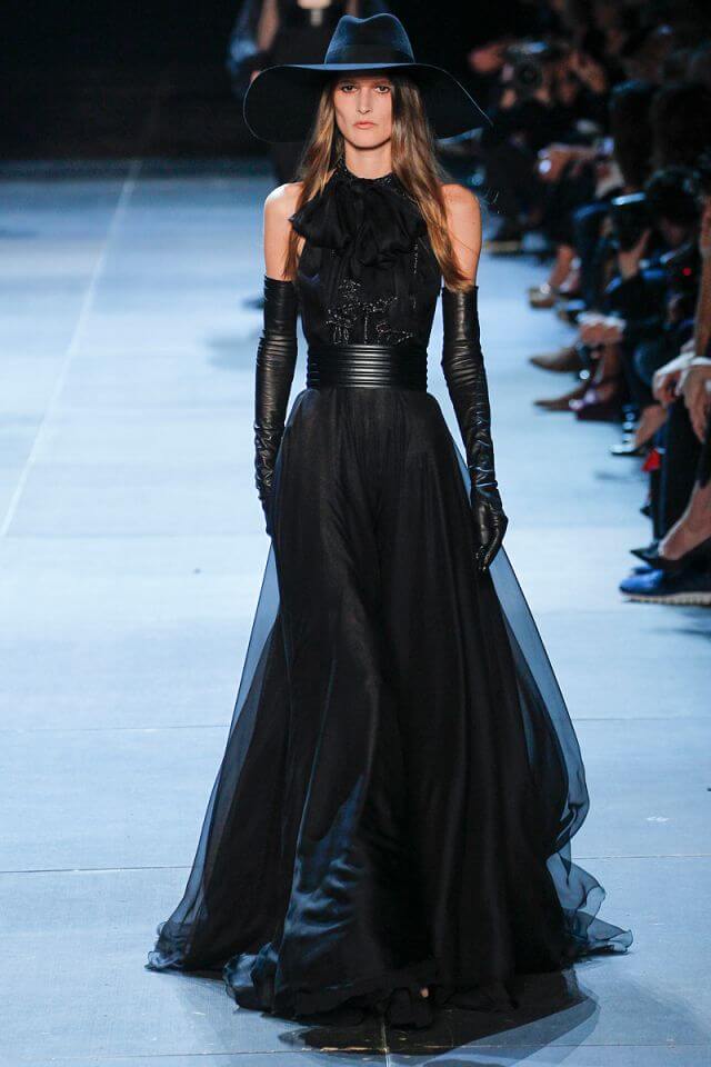 A picture of a model on the catwalk for Yves Saint Laurent 2013.