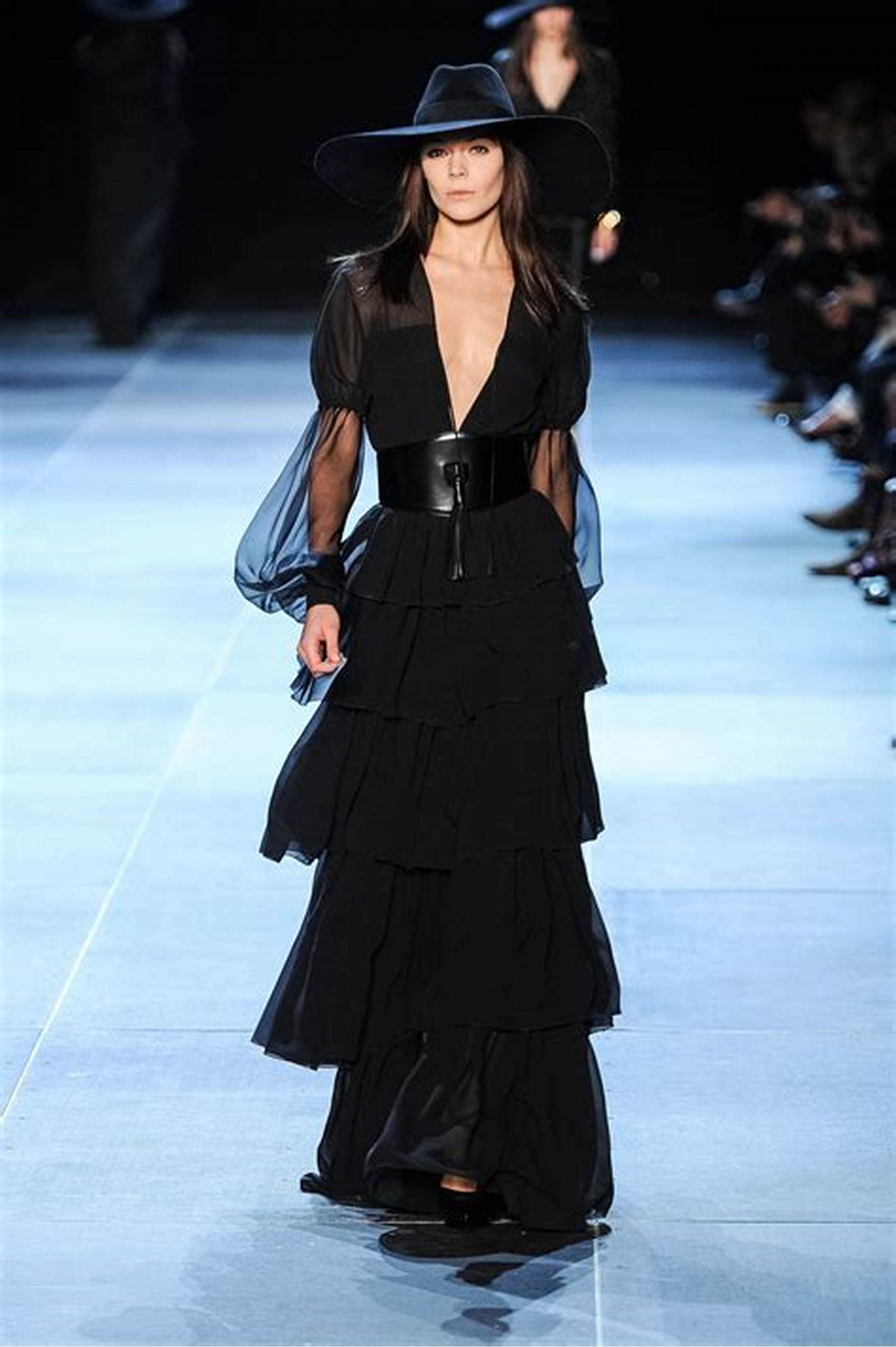 A picture of a model on the catwalk for Yves Saint Laurent 2013.
