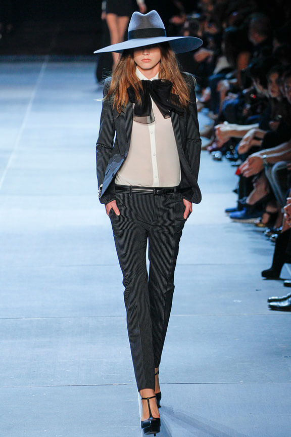 A picture of a model on the catwalk for Yves Saint Laurent 2013.