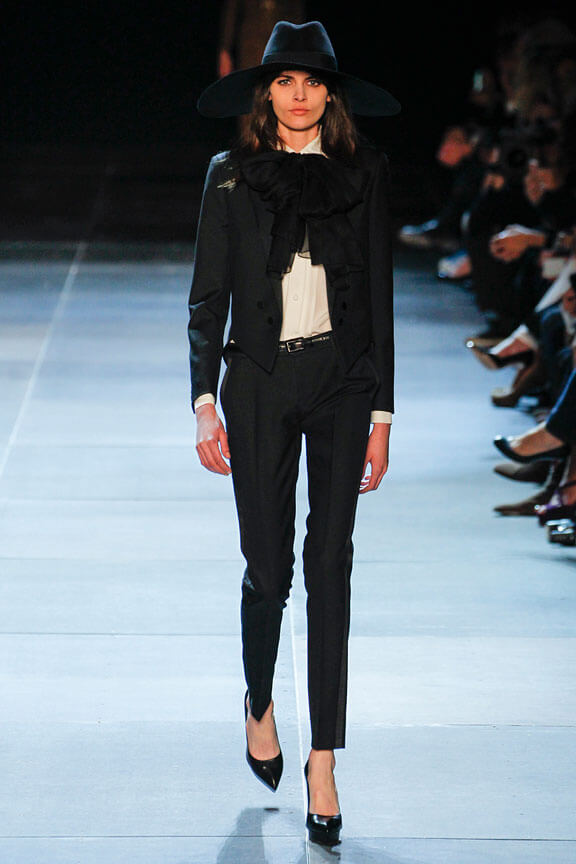 A picture of a model on the catwalk for Yves Saint Laurent 2013.