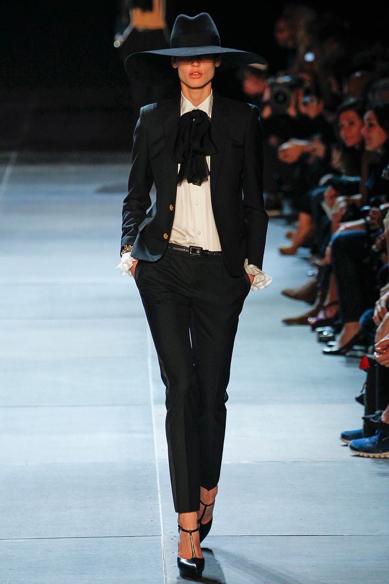 A picture of a model on the catwalk for Yves Saint Laurent 2013.