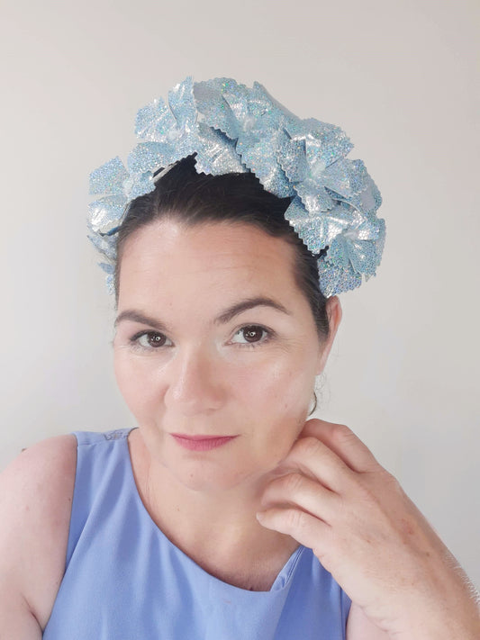 A picture of a blue pleather millinery crown by Melissa Rath Millinery