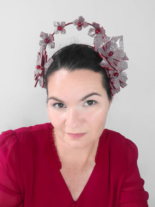 A picture of a red millinery crown halo by Melissa Rath Millinery