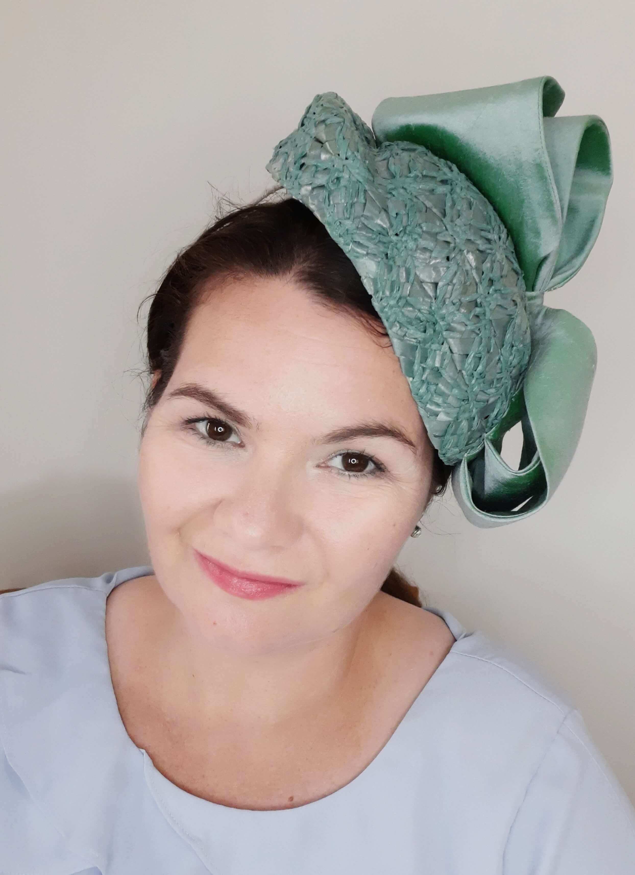 A picture of a green braided millinery beret by Melissa Rath Millinery