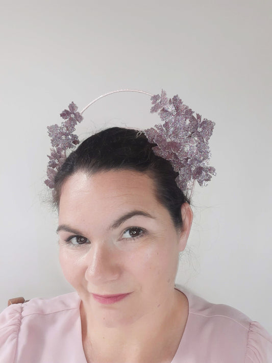 A picture of a pink crown with halo by Melissa Rath Millinery